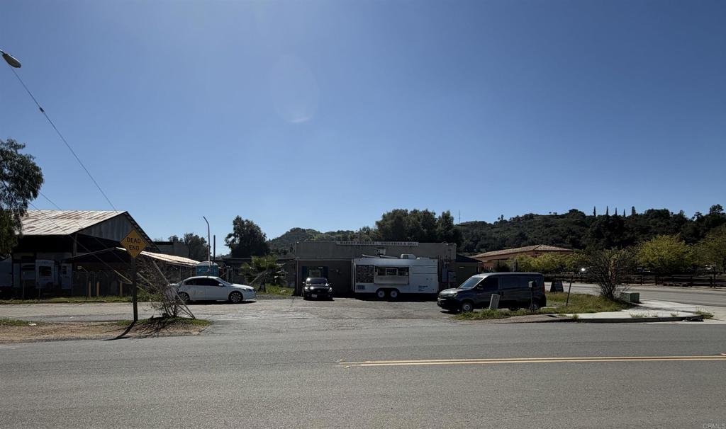 27455 Valley Center Road Valley Center, CA 92082 - Photo 4 of 4 a car parked on the side of the road