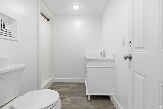 916 North Bonneville Road Preston, ID 83263 - Photo 11 of 37 Bathroom with vanity and light wood-style flooring