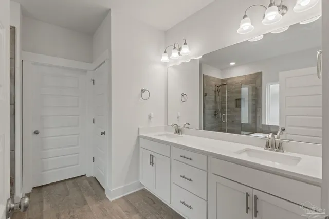 a bathroom with a tub and a shower