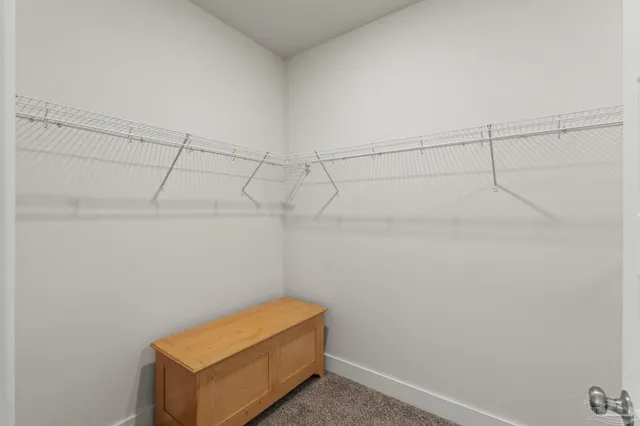 a room with bed and a window