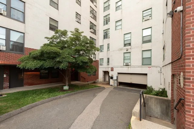 a building view with a garden space