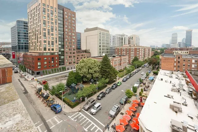 a view of a city with tall buildings