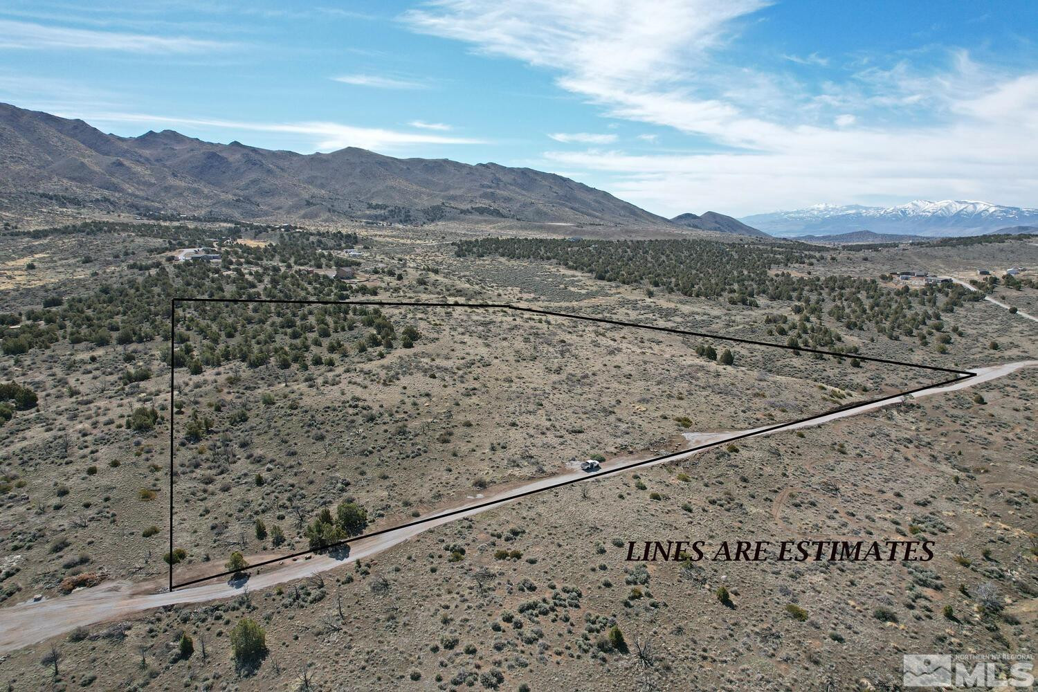 0 Mask Lane Reno, NV 89508 - Photo 1 of 10 a view of a dry yard with mountains