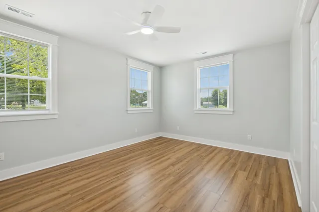 a backyard of a house with lots of green space