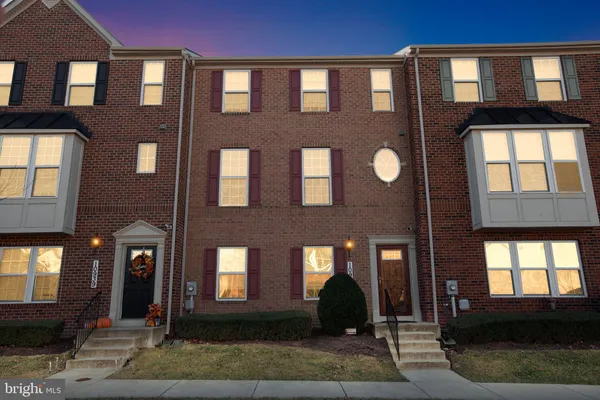 a front view of a multi story residential apartment building