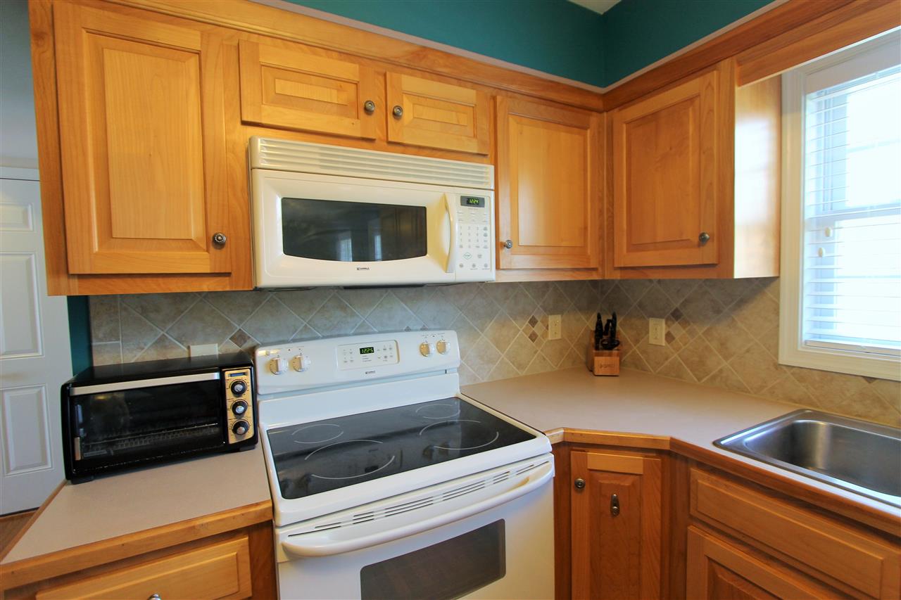 796 Ladd Road Waynesboro, VA 22980 - Photo 8 of 36 a kitchen with granite countertop cabinets appliances and a sink