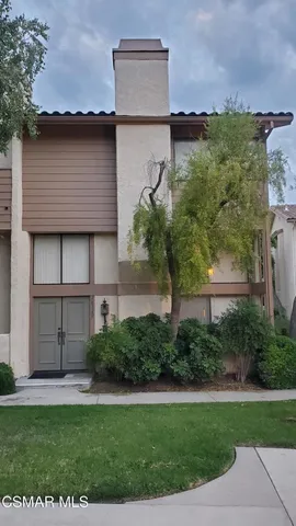 a view of a back yard of the house