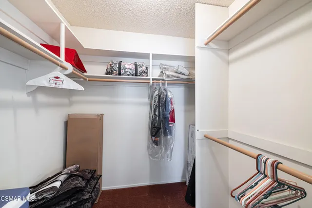 a room with lots of stuff and hardwood floor