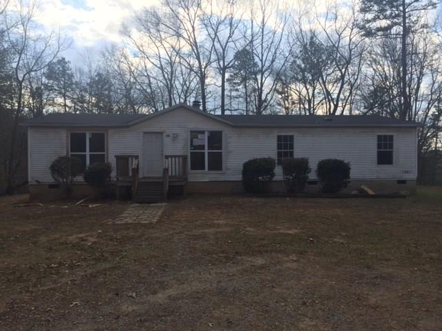 539 Old Ridge Road Ellijay, GA 30540 - Photo 1 of 1 a view of a house with backyard and a garden