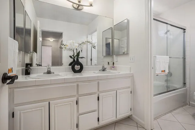 a view of a dining room with furniture and window