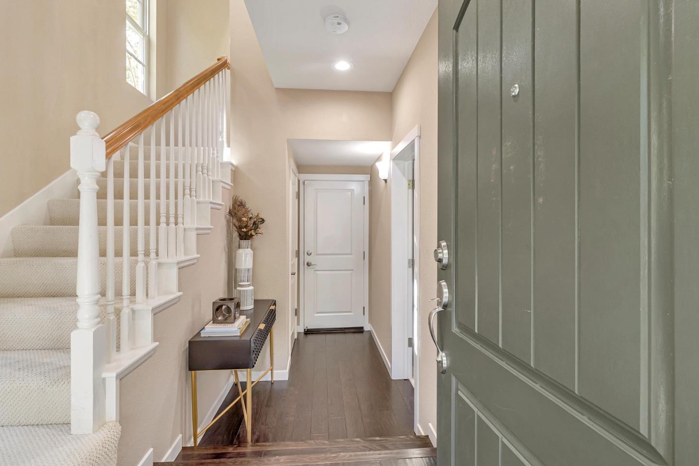301 Pine Way Mountain View, CA 94041 - Photo 3 of 20 a view of a hallway with entryway wooden floor and front door