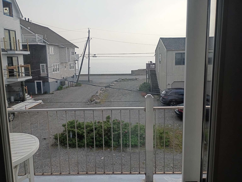 6 Tilden Avenue Scituate, MA 02066 - Photo 17 of 34 a balcony with table and chairs