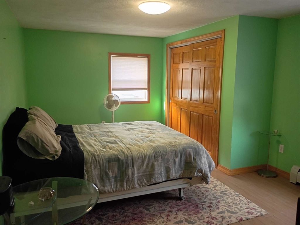 6 Tilden Avenue Scituate, MA 02066 - Photo 21 of 34 a bedroom with a bed and a window