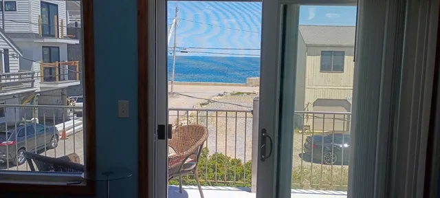 a bedroom with a bed and a fireplace