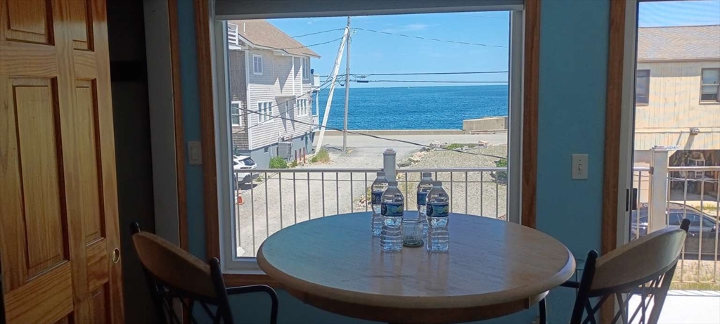 6 Tilden Avenue Scituate, MA 02066 - Photo 32 of 34 a view of a dining room with furniture window and wooden floor