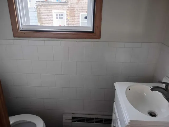 a bathroom with a sink and a toilet