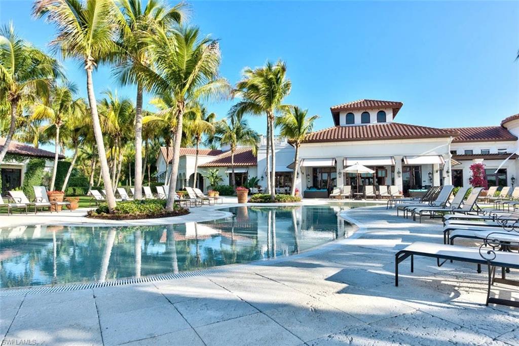 19741 Marino Lake Circle, Unit 802 Miromar Lakes, FL 33913 - Photo 29 of 38 a view of house with outdoor space and swimming pool
