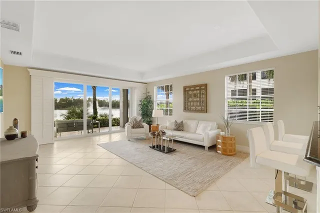 $525,000 | 19741 Marino Lake Circle, Unit 802, Miromar Lakes, FL 33913