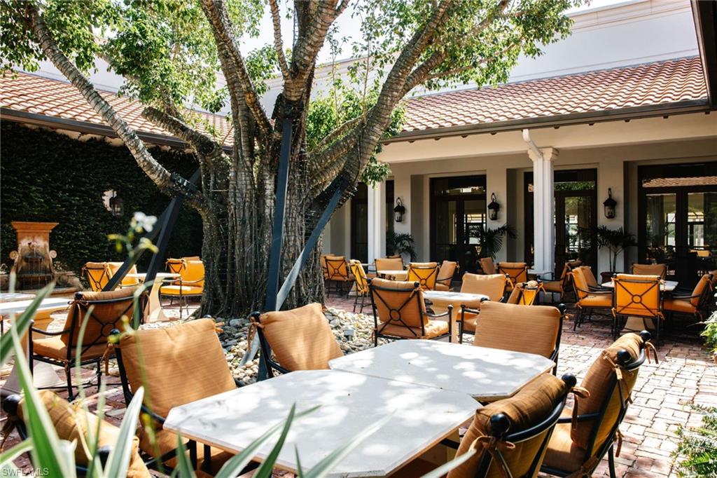 19741 Marino Lake Circle, Unit 802 Miromar Lakes, FL 33913 - Photo 33 of 38 a view of outdoor space yard deck and patio