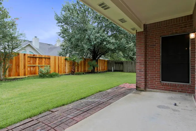 a view of a house with a garden