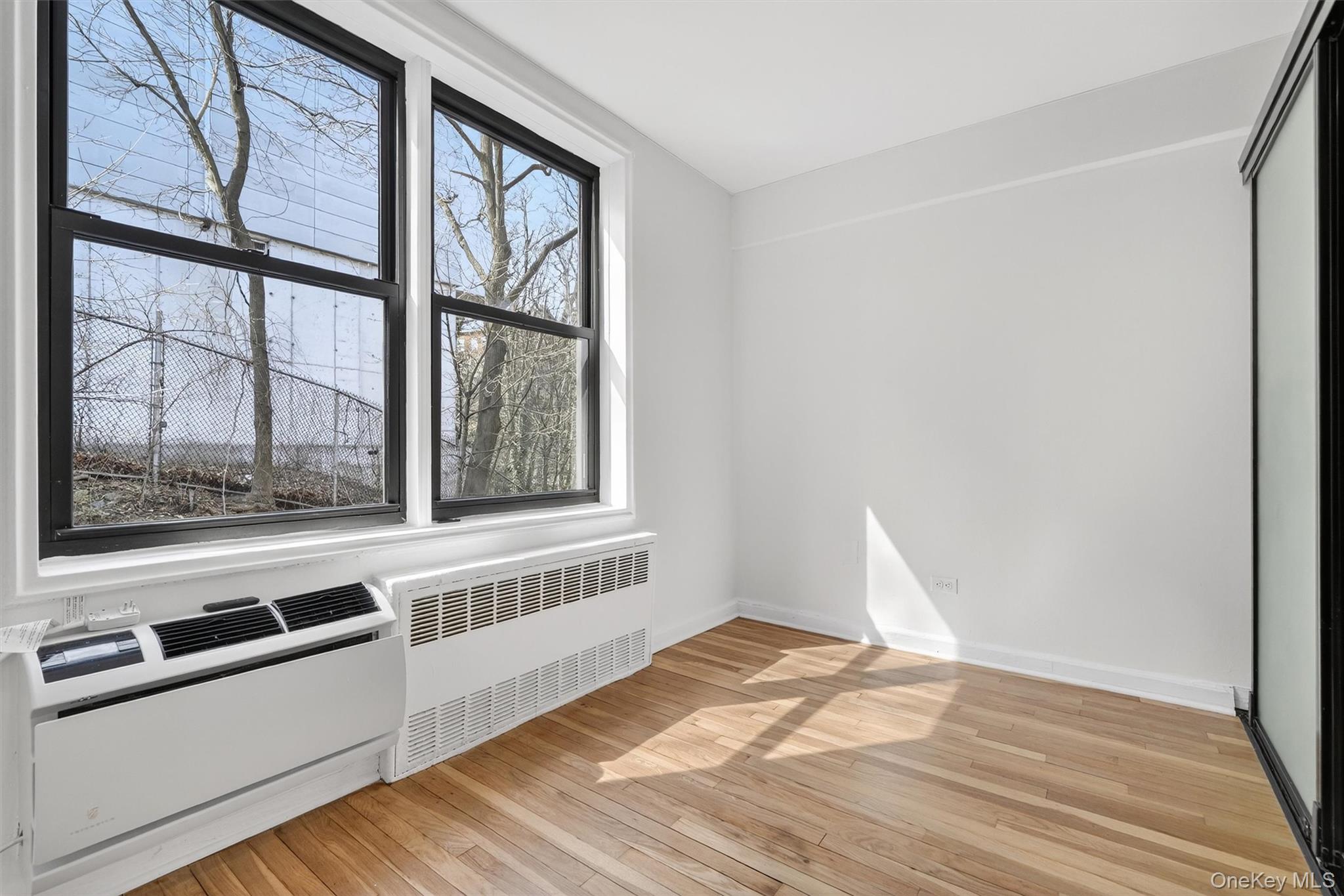 5235 Post Road, Unit 5A Bronx, NY 10471 - Photo 11 of 23 What do you need a little extra space for? Enjoy the birds and beautiful trees outside the window.