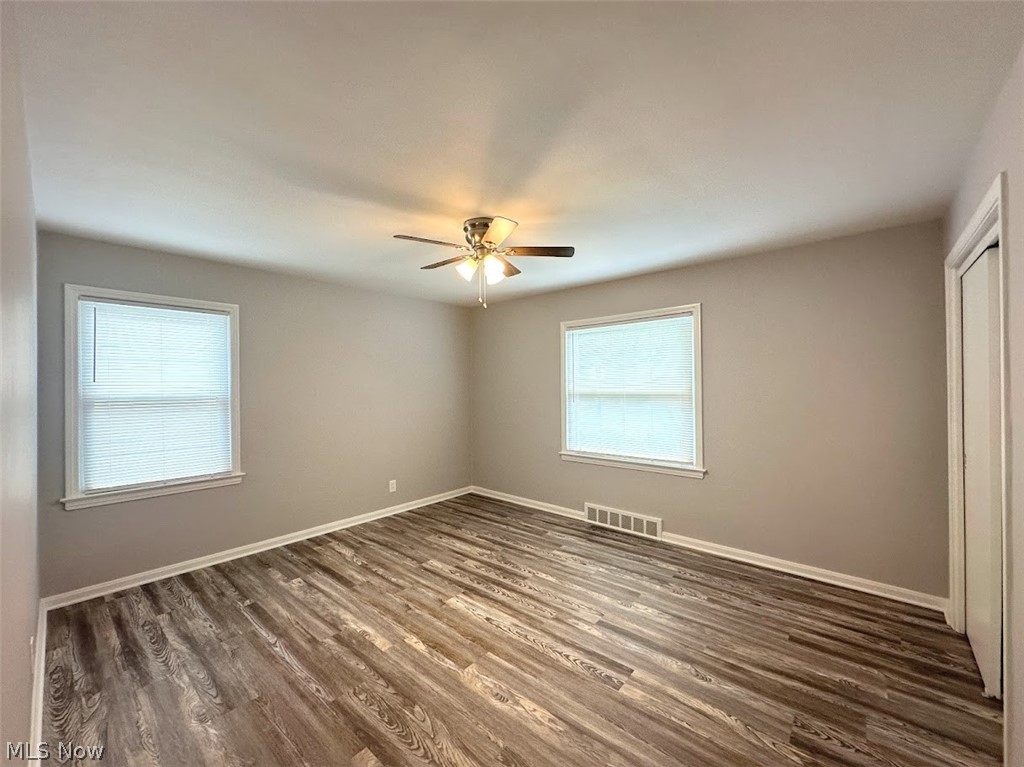 4227 Eastway Road South Euclid, OH 44121 - Photo 9 of 18 Empty room featuring ceiling fan and hardwood / wood-style floors