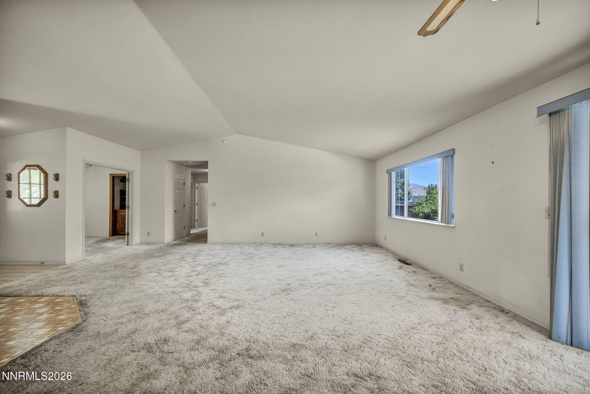 692 Lassen Way Gardnerville, NV 89460 - Photo 7 of 34 an empty room with windows