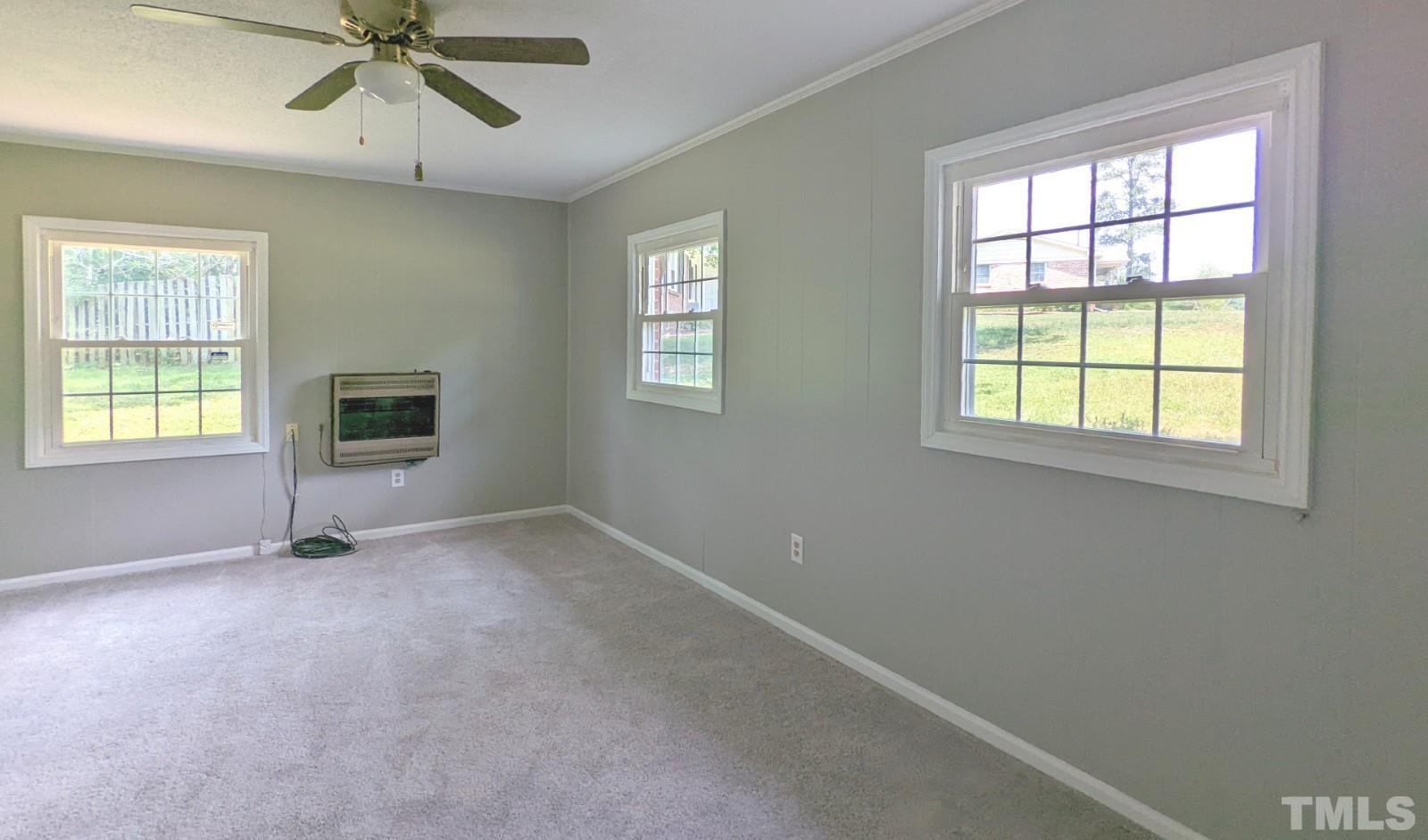 4901 Vallery Place Raleigh, NC 27604 - Photo 18 of 22 a view of an empty room with a window