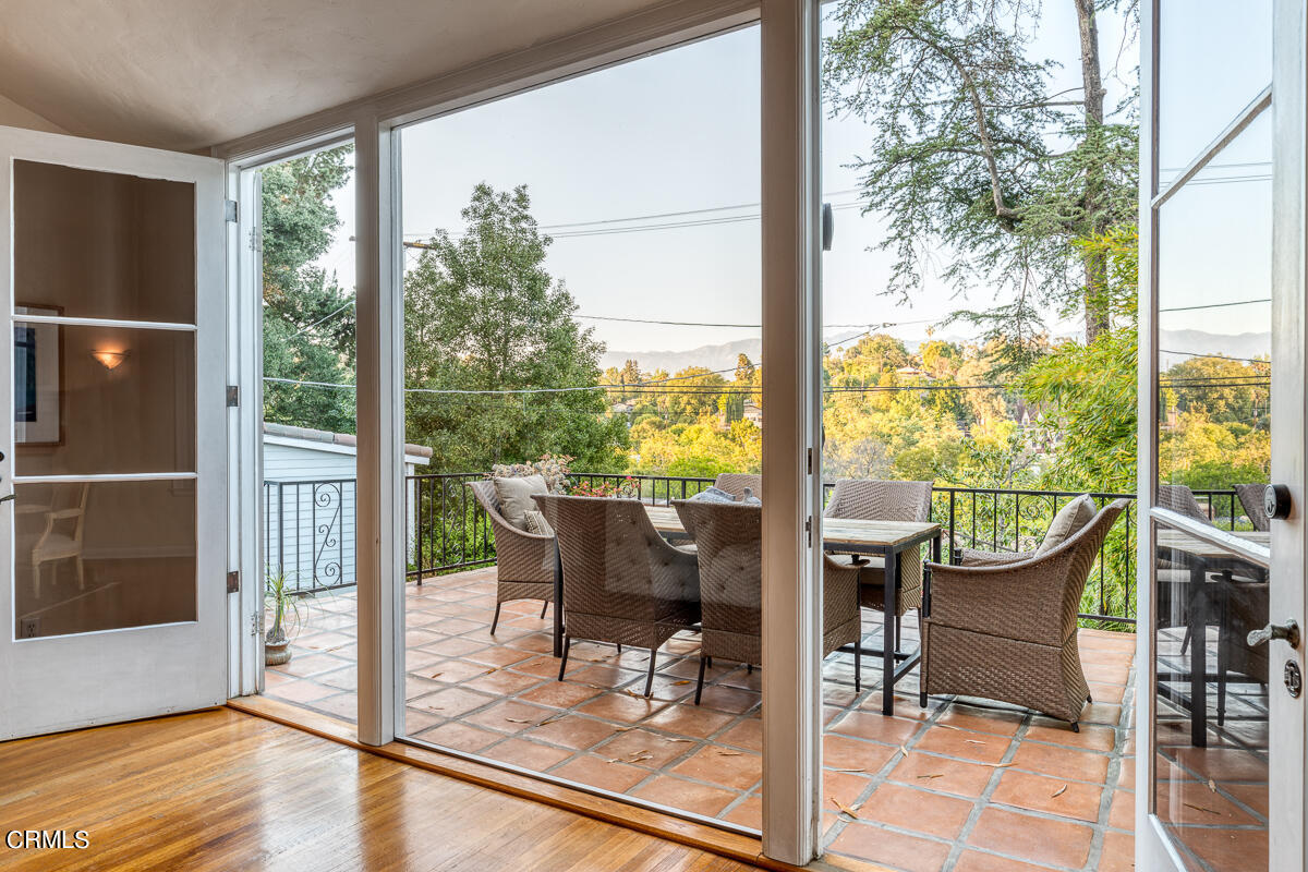 1659 Kaweah Drive Pasadena, CA 91105 - Photo 11 of 46 a view of a dining room with furniture window and wooden floor