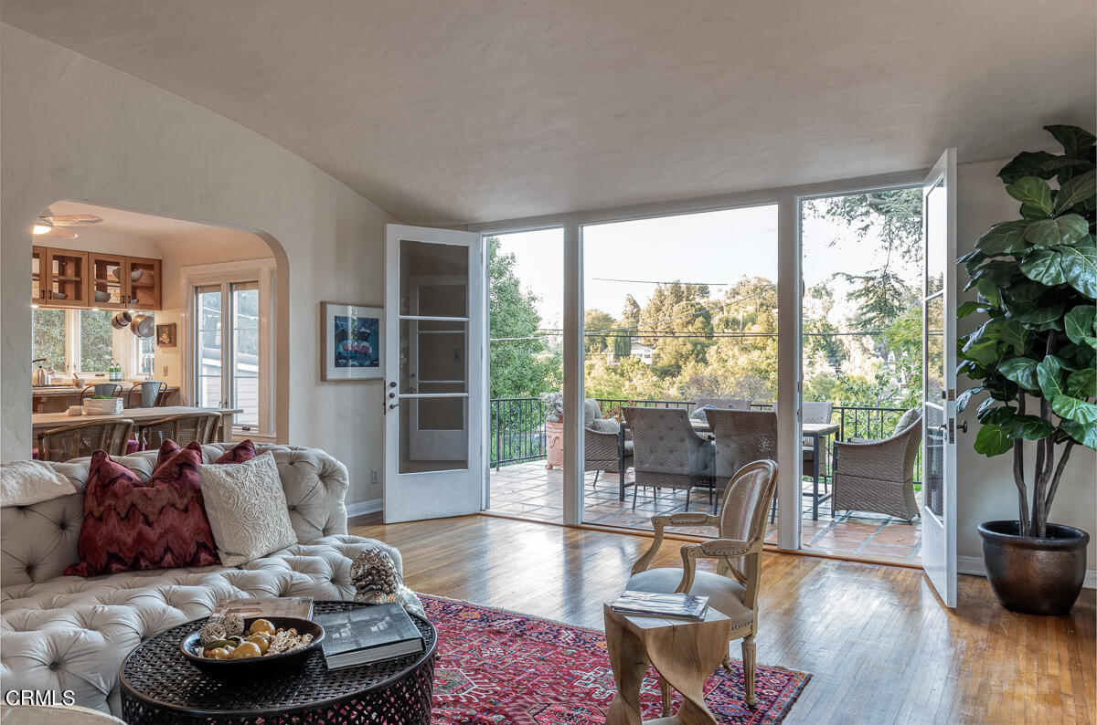 1659 Kaweah Drive Pasadena, CA 91105 - Photo 14 of 46 a living room with furniture and a potted plant