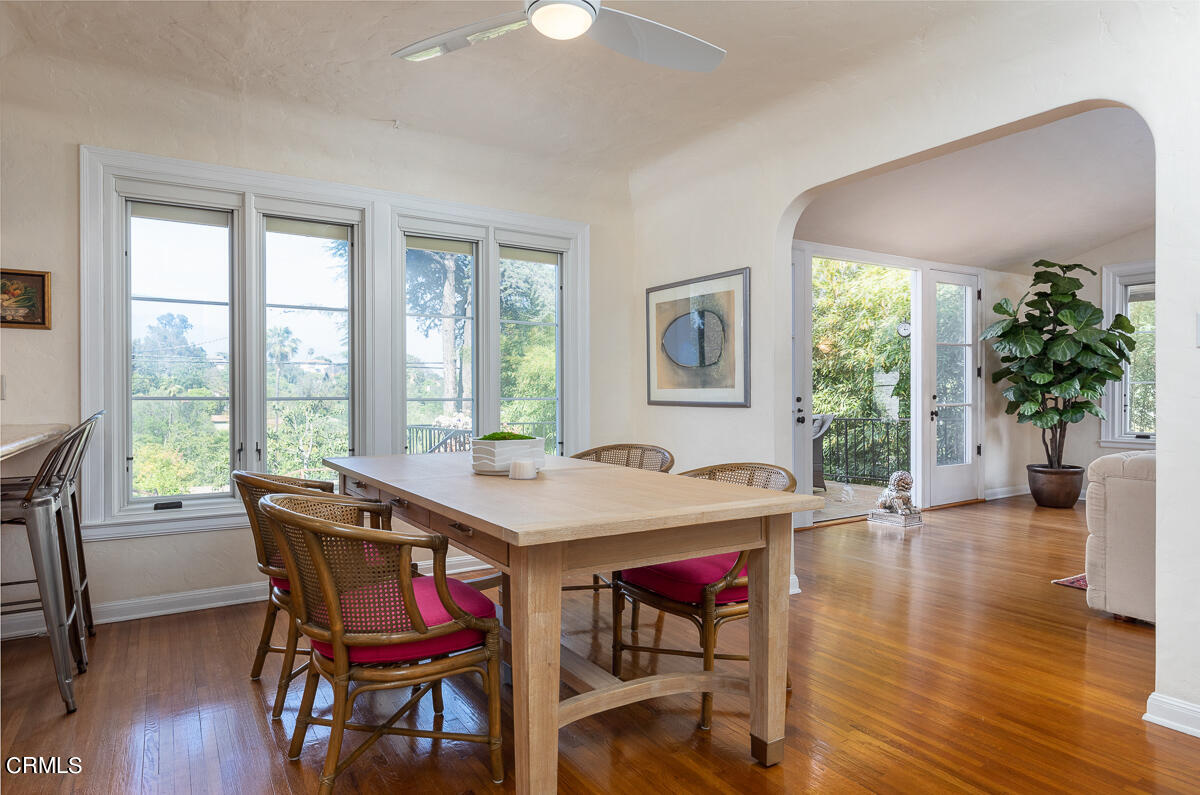 1659 Kaweah Drive Pasadena, CA 91105 - Photo 16 of 46 a view of a dining room with furniture window and wooden floor