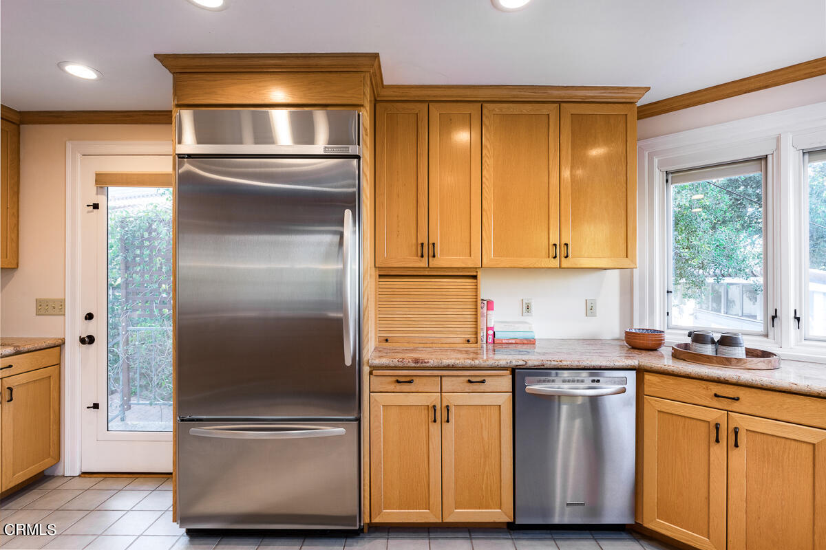 1659 Kaweah Drive Pasadena, CA 91105 - Photo 21 of 46 a kitchen with stainless steel appliances granite countertop a refrigerator and a sink