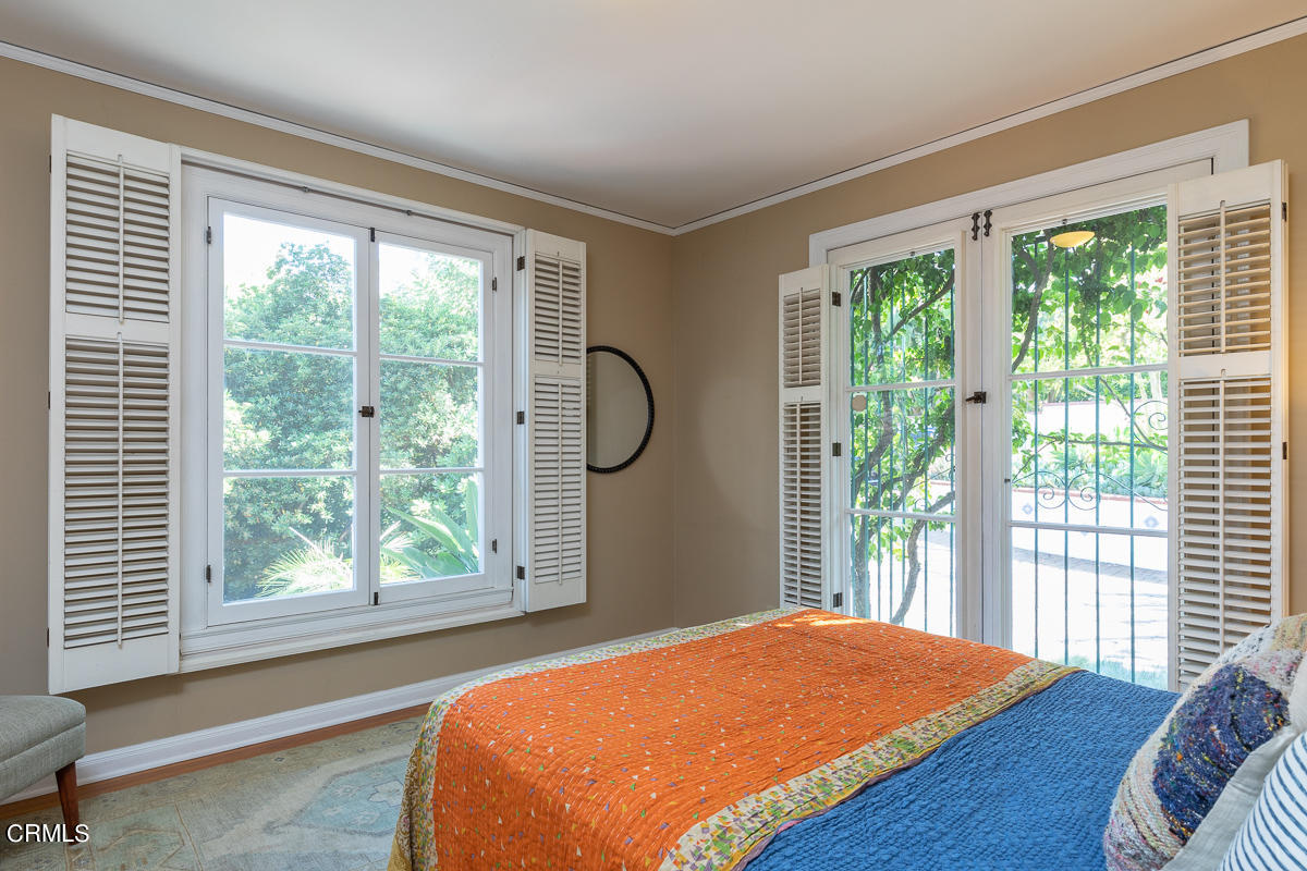 1659 Kaweah Drive Pasadena, CA 91105 - Photo 33 of 46 a bedroom with a large bed and a window
