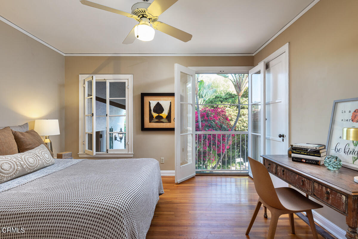 1659 Kaweah Drive Pasadena, CA 91105 - Photo 35 of 46 a bedroom with a bed and wooden floor