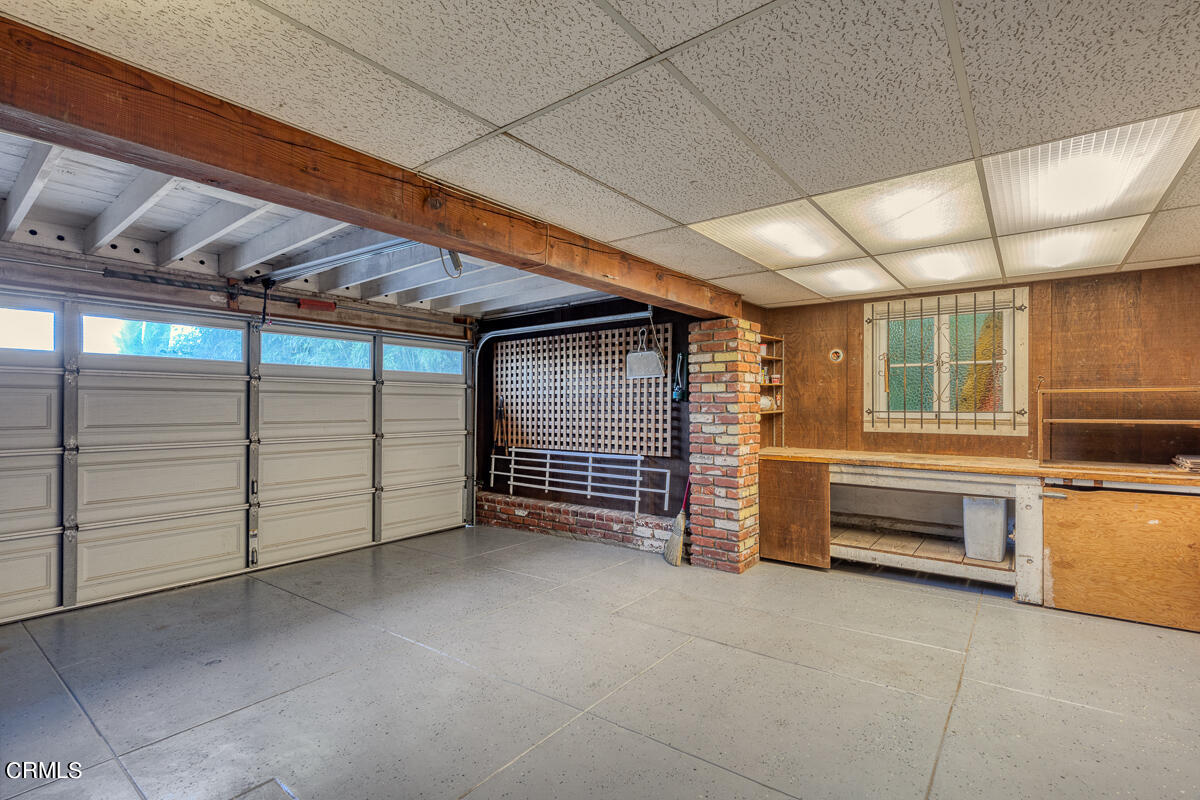 1659 Kaweah Drive Pasadena, CA 91105 - Photo 39 of 46 a view of an empty room with furniture and a window