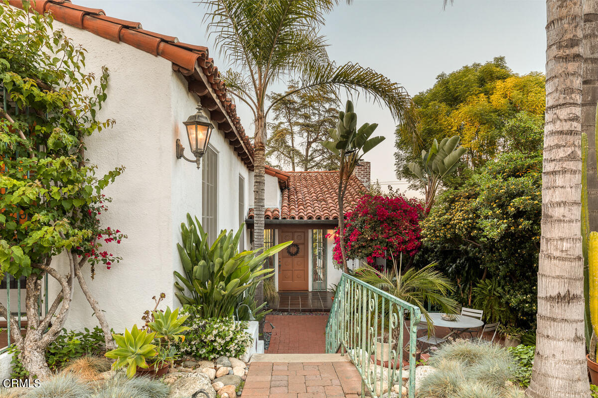 1659 Kaweah Drive Pasadena, CA 91105 - Photo 41 of 46 a view of a house with a tree and flower plants
