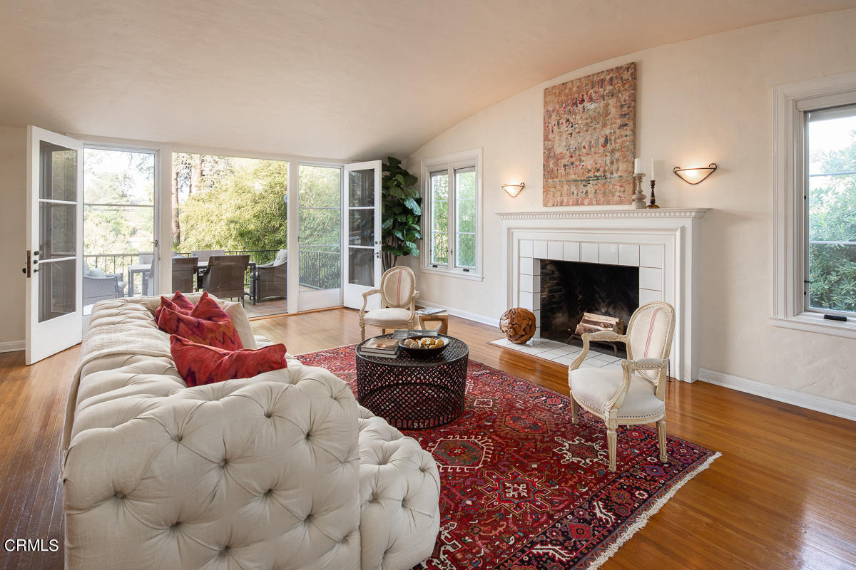 1659 Kaweah Drive Pasadena, CA 91105 - Photo 9 of 46 a living room with furniture large window and a fireplace