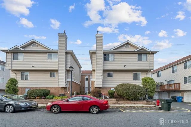 a car parked in front of a house