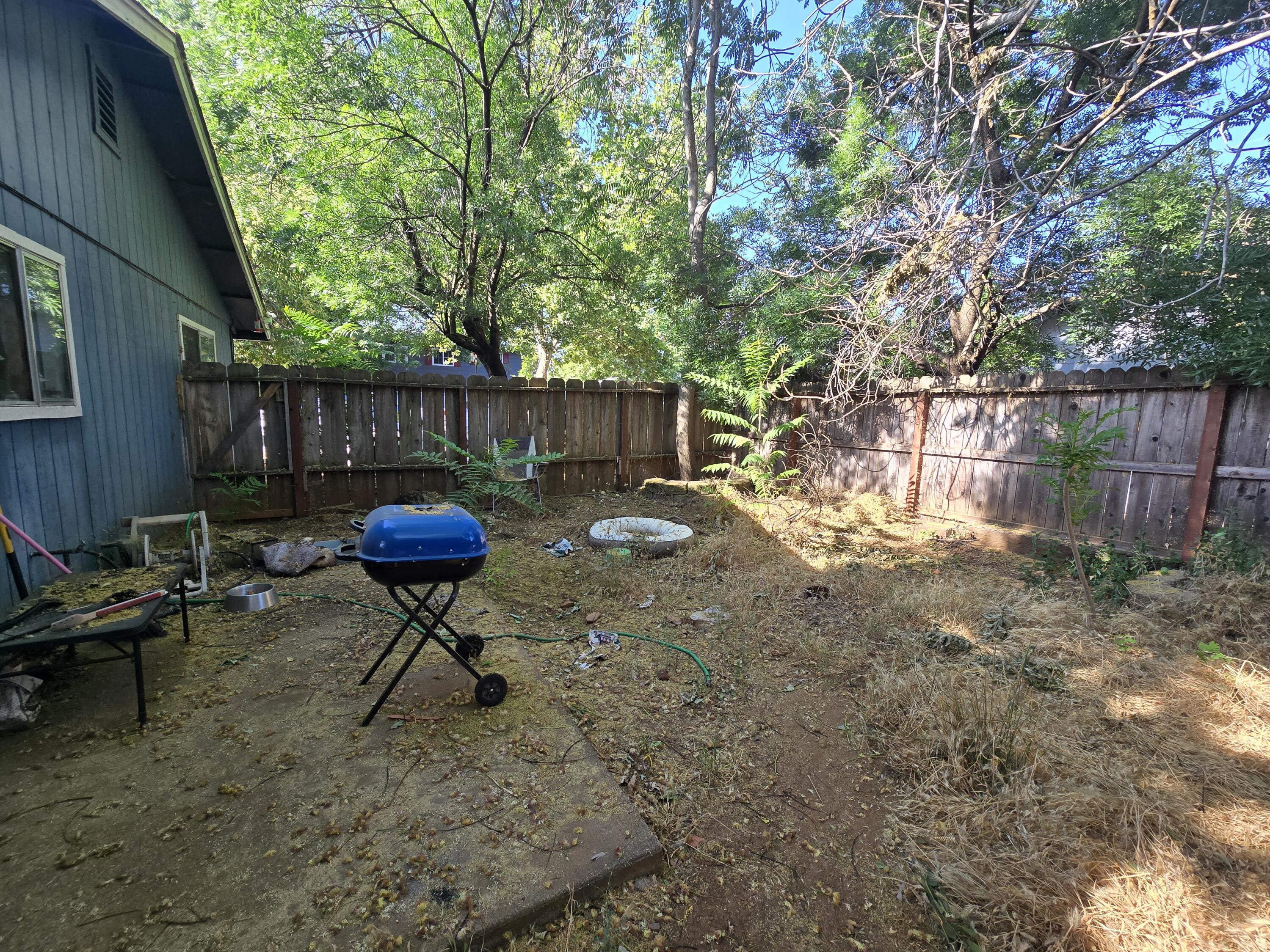 1591 Canby Road Redding, CA 96002 - Photo 12 of 15 a garden view with a seating space
