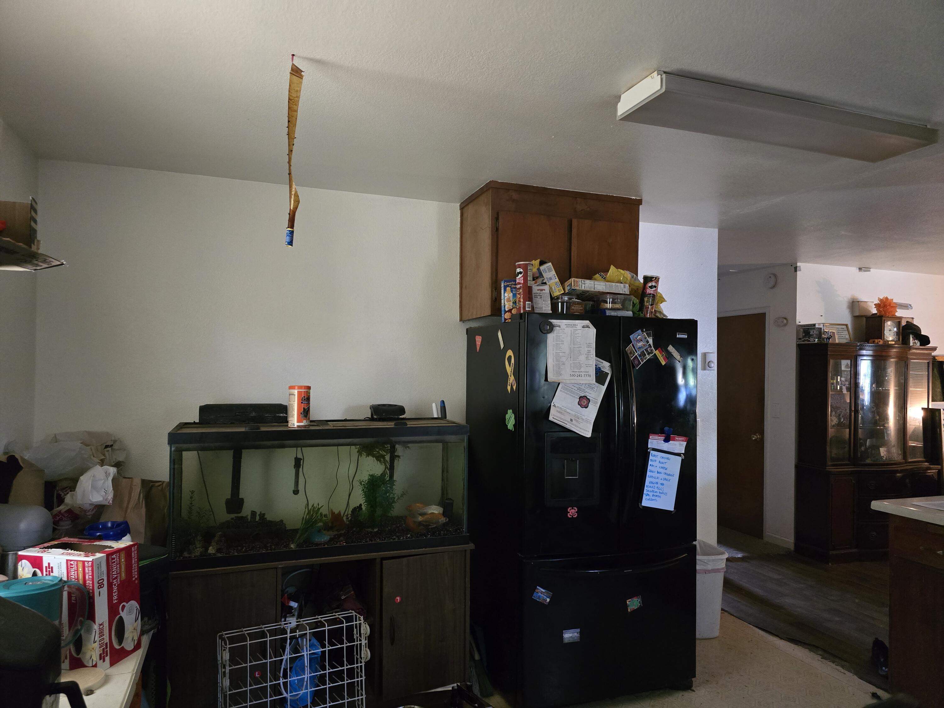 1591 Canby Road Redding, CA 96002 - Photo 4 of 15 a room with lots of storage and utility