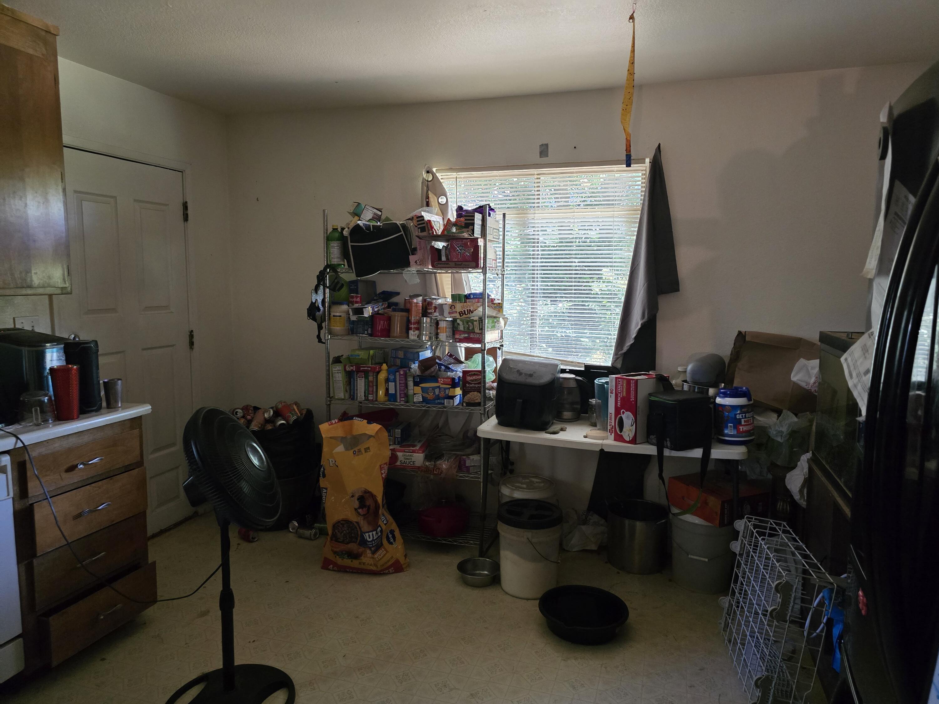 1591 Canby Road Redding, CA 96002 - Photo 5 of 15 a room with gym equipment and a large window