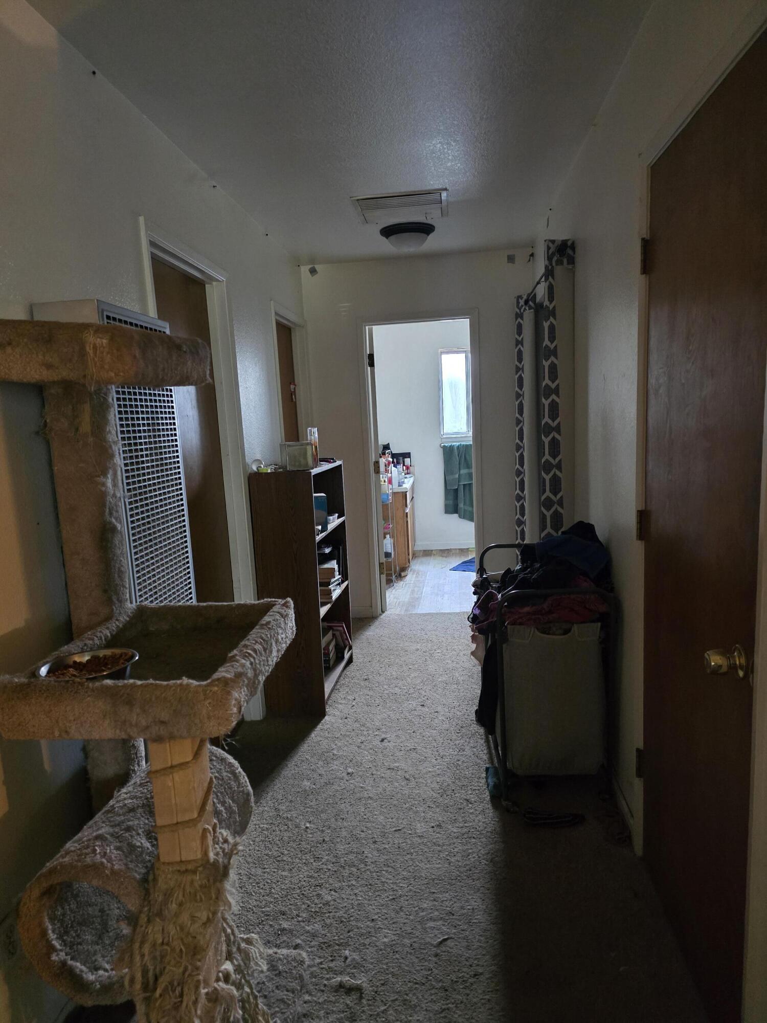 1591 Canby Road Redding, CA 96002 - Photo 8 of 15 a living room with furniture and a mirror