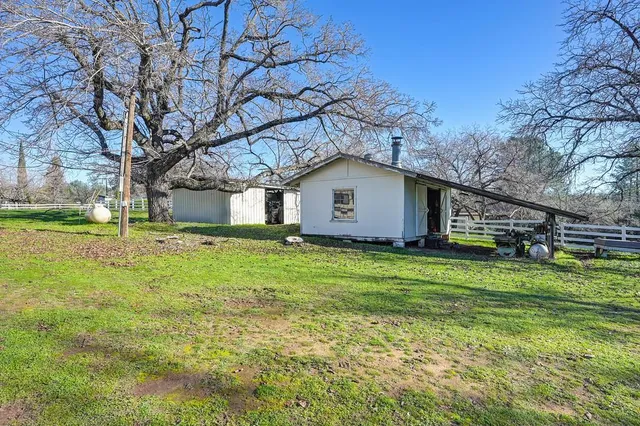 a house view with a garden space