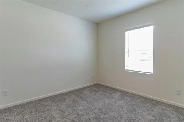 a bathroom with a double vanity sink and mirror