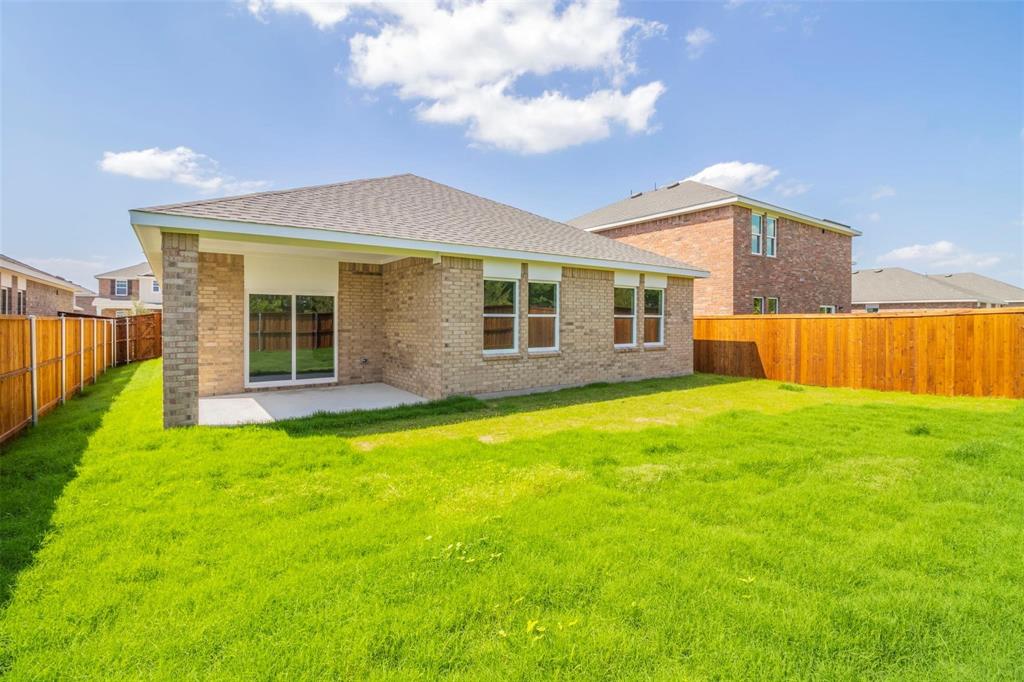 1848 McCree Street Forney, TX 75126 - Photo 21 of 33 a view of a house with backyard and porch