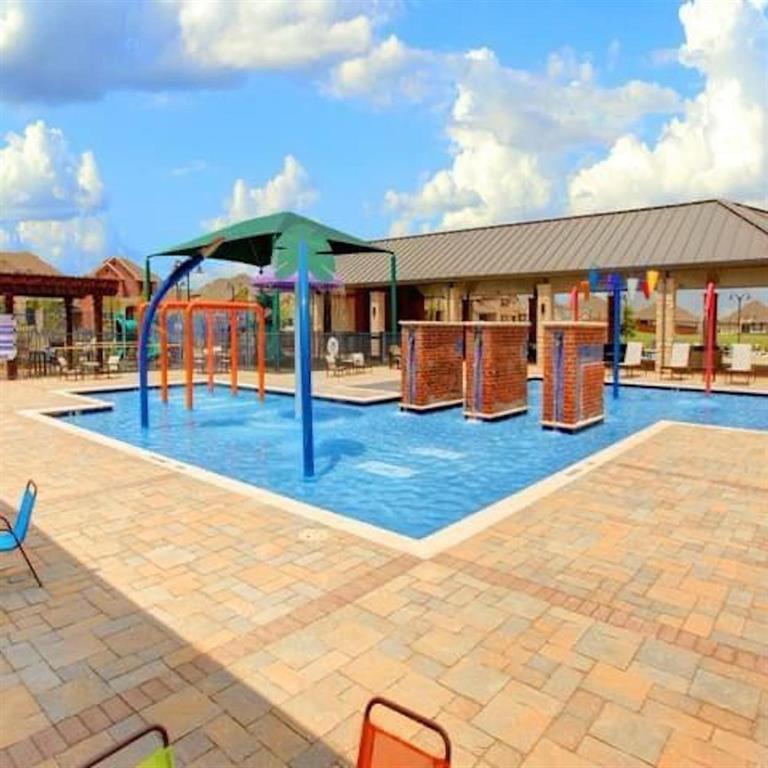 1848 McCree Street Forney, TX 75126 - Photo 30 of 33 Community pool featuring a water play area and a patio