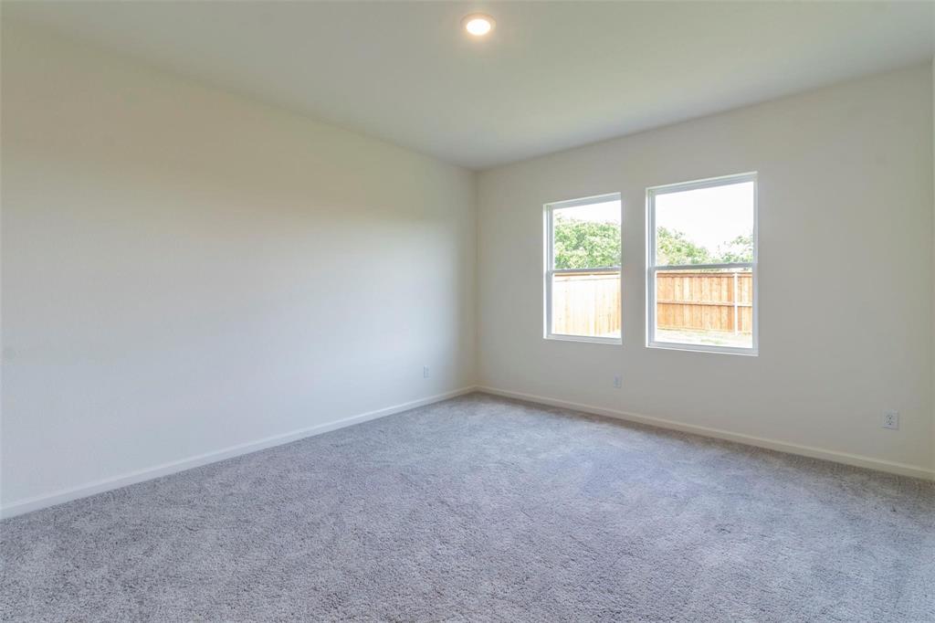 1848 McCree Street Forney, TX 75126 - Photo 6 of 33 Spare room featuring carpet floors and recessed lighting