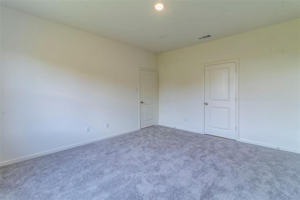 1848 McCree Street Forney, TX 75126 - Photo 7 of 33 an empty room with an entryway