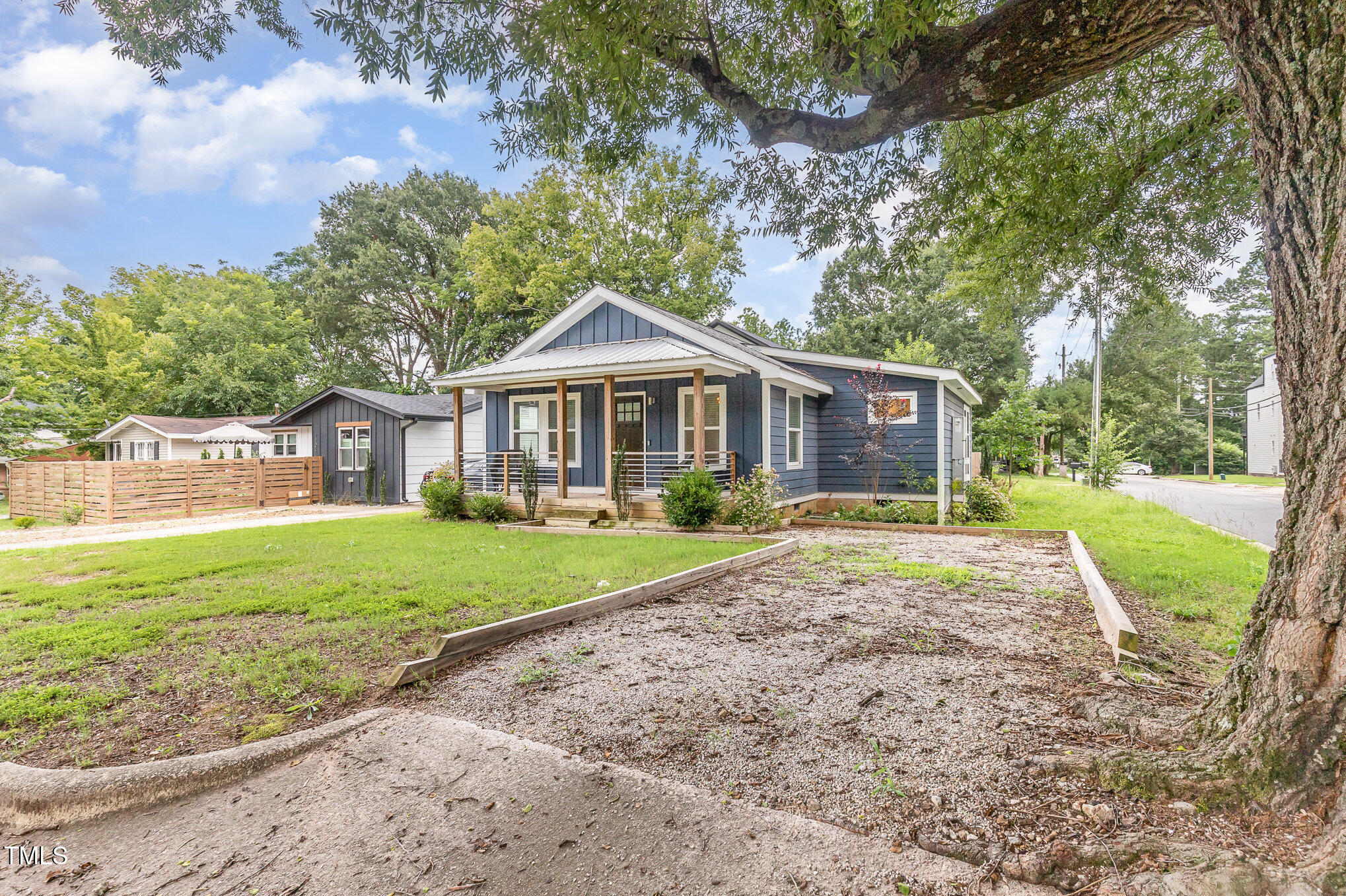 819 Cumberland Street Raleigh, NC 27610 - Photo 21 of 21 a view of a yard in front of house
