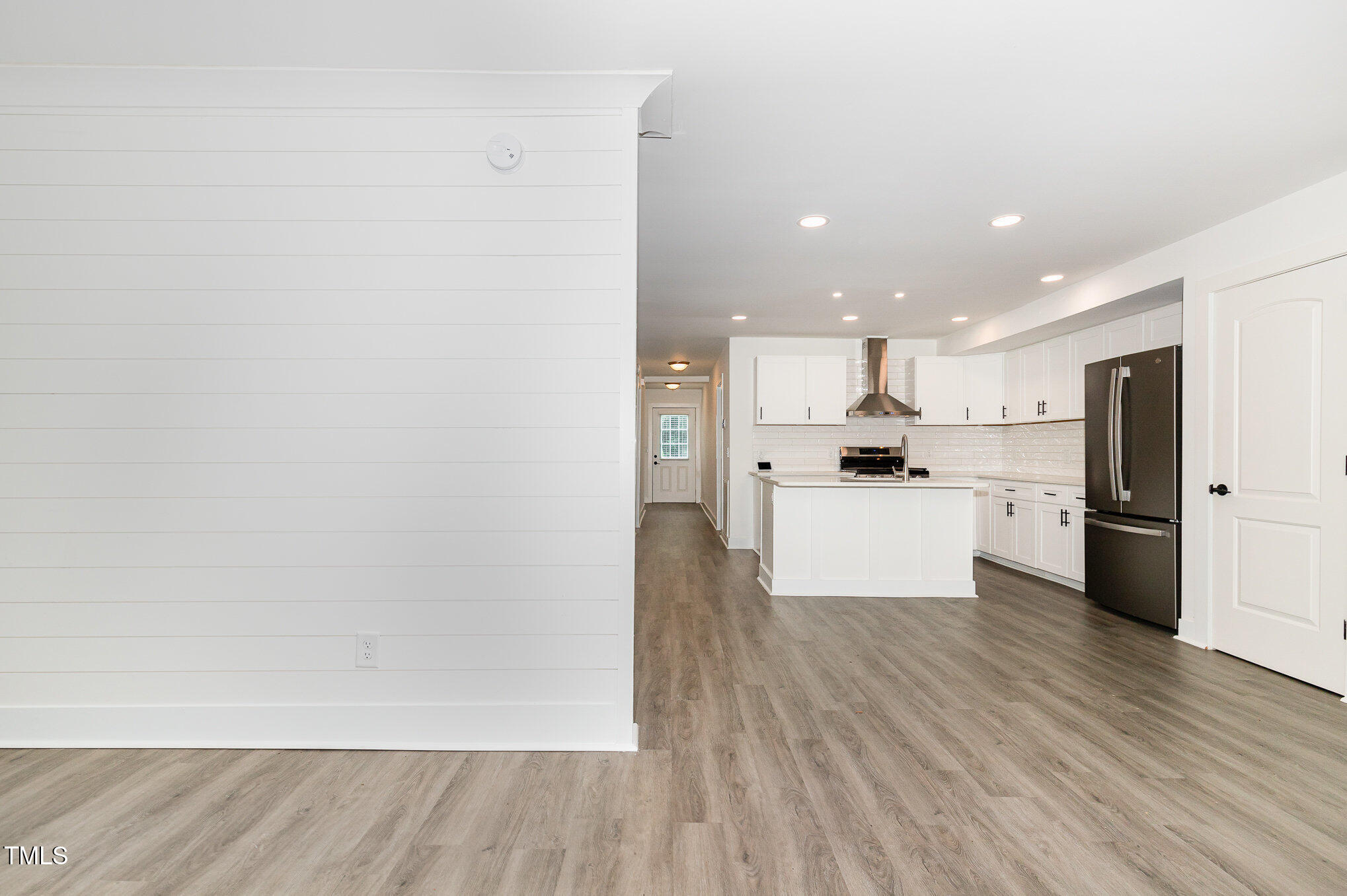 819 Cumberland Street Raleigh, NC 27610 - Photo 6 of 21 a view of kitchen with wooden floor